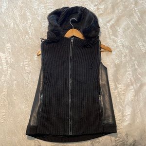 Barely worn Elie Tahari brown vest with leather trim on the side and fur hood
